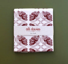Load image into Gallery viewer, Pohutukawa Tea Towels and Aprons By Ali Davies
