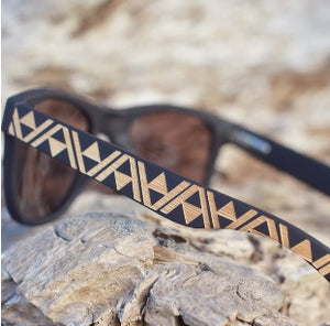 Sunglasses with kowhaiwhai patterned arms by Miriama Grace-Smith.